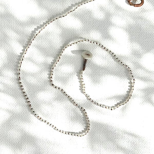 Delicate Knotted Strands
